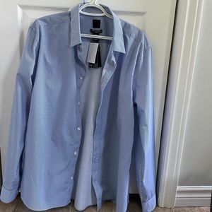 Two men’s XL Dress shirts, never worn